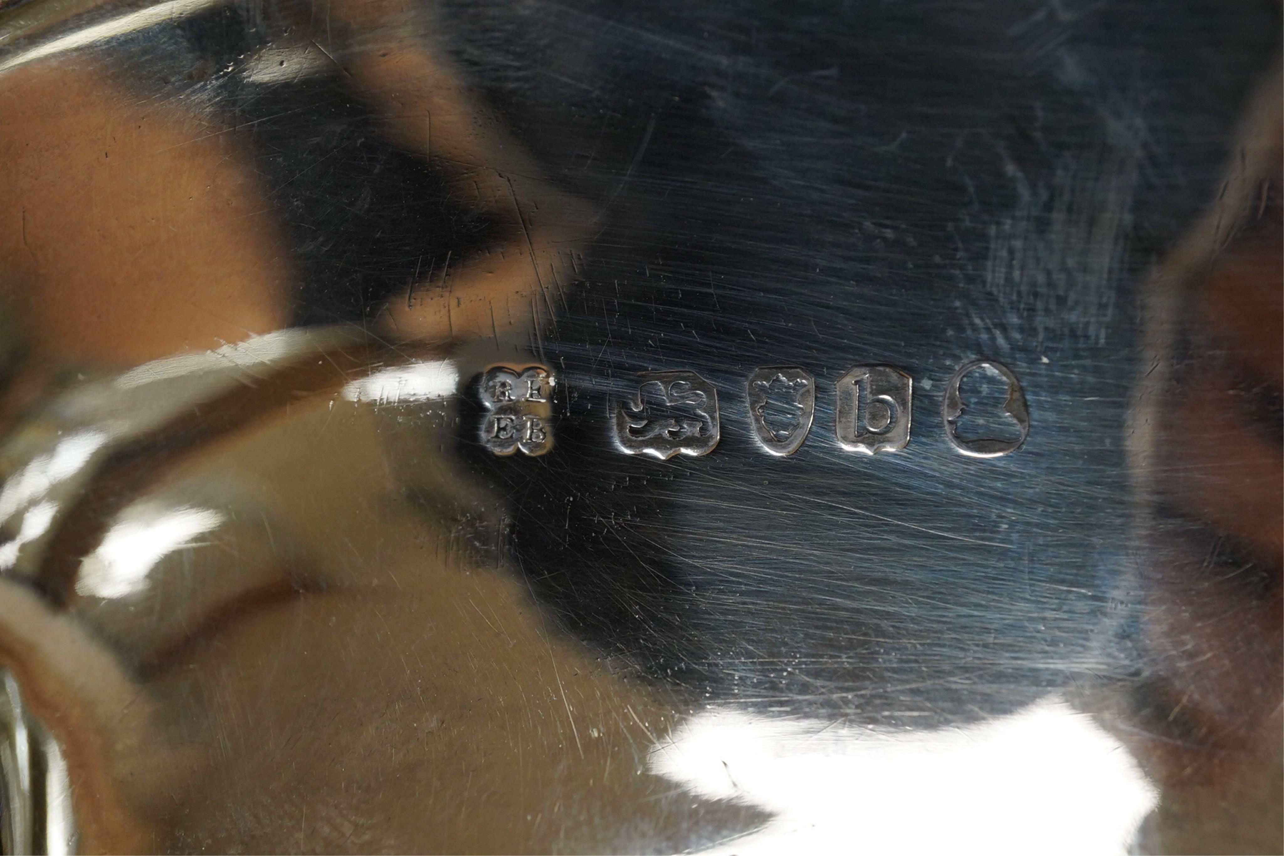 A late George III silver snuffers tray by Eames and Barnard, London, 1817, with foliate border, 26.2cm, 8.5oz.